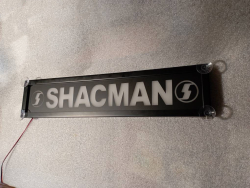 Светящаяся табличка под лобовое стекло Shacman. Светящаяся табличка на лобовое стекло Shacman была изготовлена на заказ. Shacman китайский самосвал очень распространён в России,  самосвалы позиционируются в качестве самоходных машин, которые способны прои