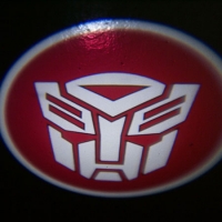 Беспроводная подсветка дверей с логотипом Autobots 7W