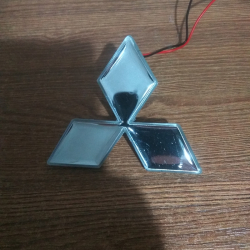 Подсветка логотипа,Подсветка логотипа MITSUBISHI Lancer-eX,купить,заказать,доставка,логотип,мужу,брату,любимому,подарок,купить,заказать,доставка,установка,тюнинг,проектор,логотип,подсветка,led,tuning,светодиодный,оплата,самовывоз,эмблема,logo,car,Москва,С